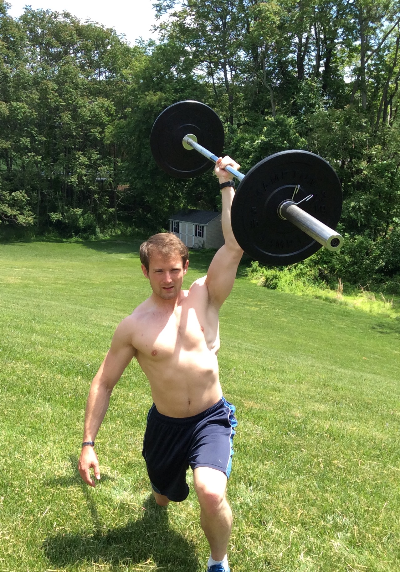 Lunge walking with over head weight